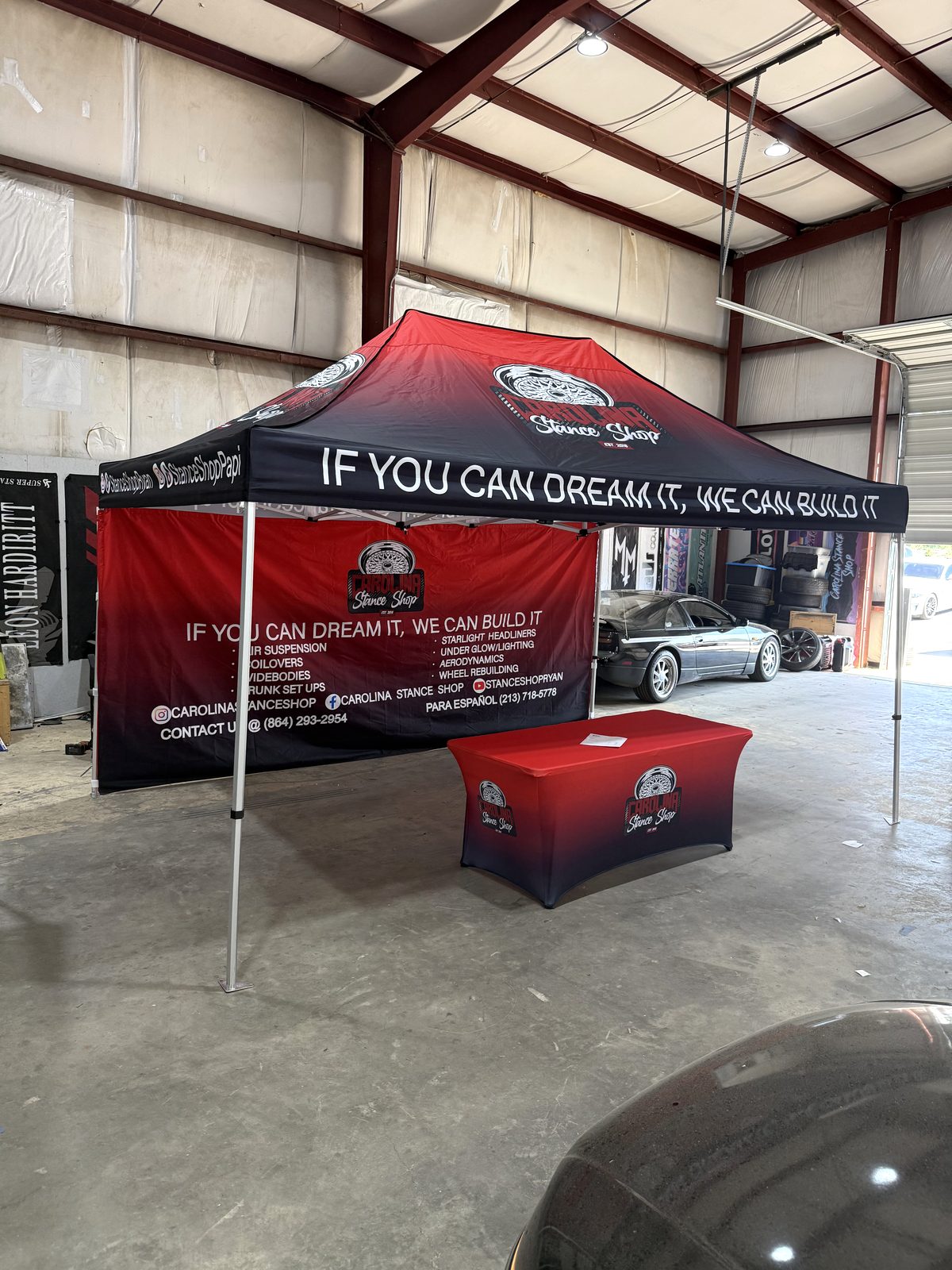 Custom printed red canopy tent with full-color dye-sublimation branding