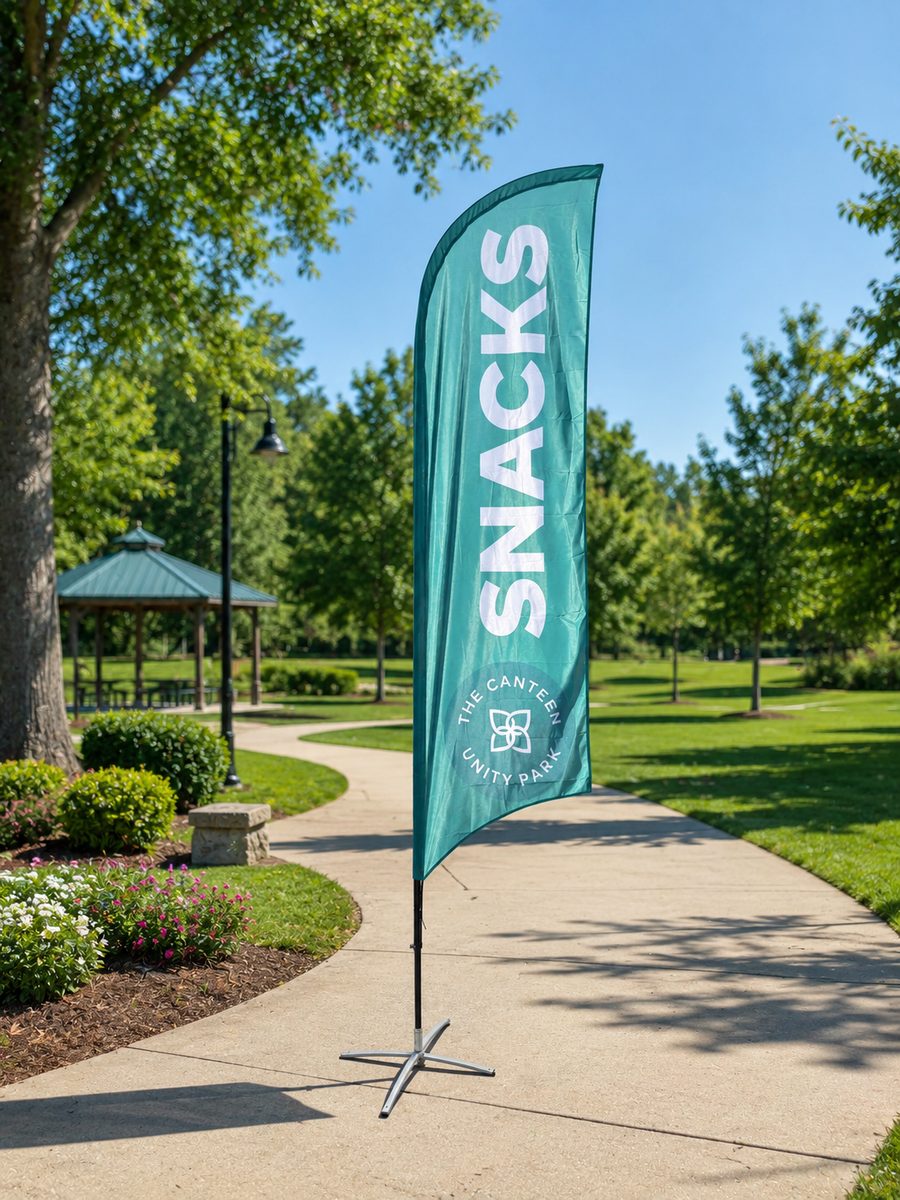 Custom printed feather flag on display outdoors at Unity Park